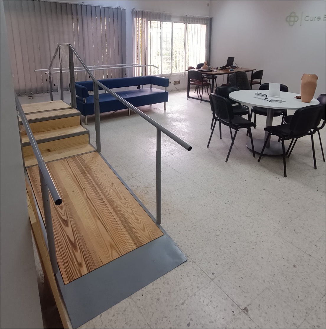 Cure Care Sousse clinic — rehabilitation room with training ramp